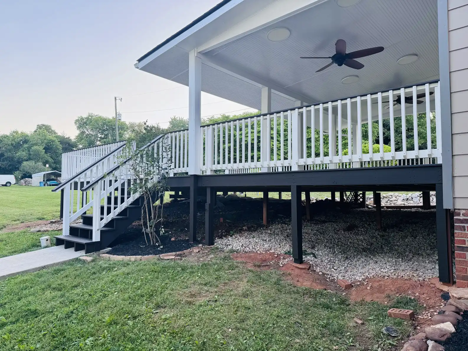 Deck and covered porch stained dark gray