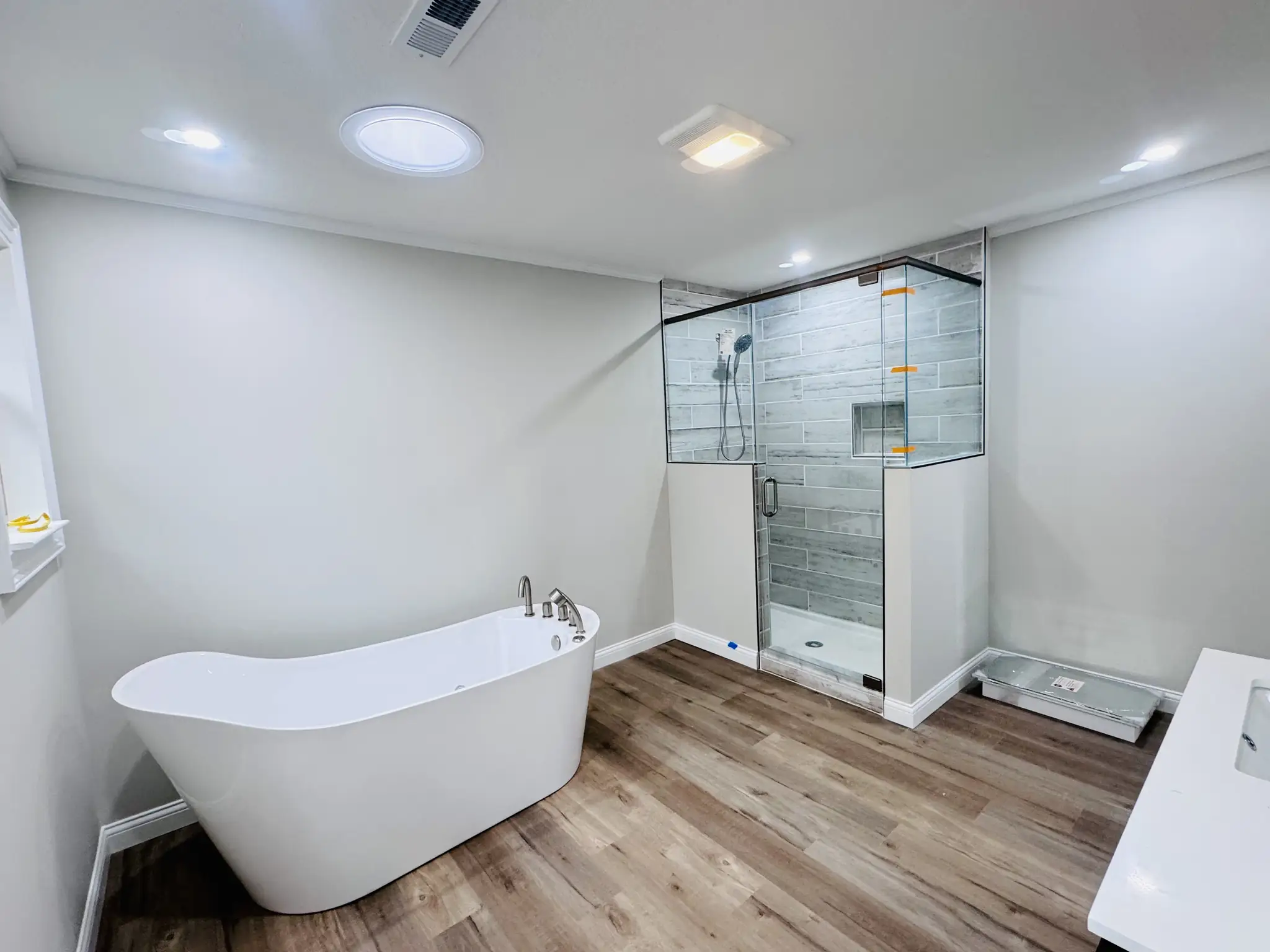 Bathroom with a freestanding tub, walls and ceiling painted